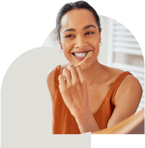 woman brushing teeth